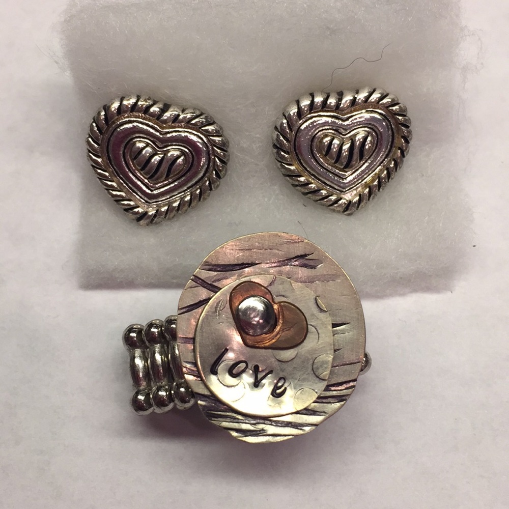 Silver ring and silver heart earrings to match.